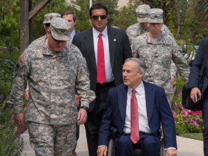 Texas Gov. Greg Abbott and Maj. Gen. William "Len" Smith, Deputy Adjutant General and Commander of the Texas Army National Guard, meet before a presentation of the Texas Purple Heart to four Texas National Guardsmen at a ceremony held at Fort Sam Houston in San Antonio, Sept. 24, 2015. The …