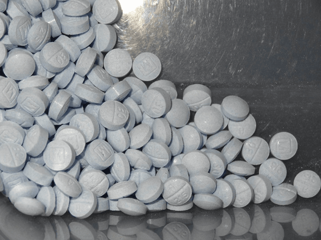 This undated file photo provided by the U.S. Attorneys Office for Utah and introduced as evidence at a trial shows fentanyl-laced fake oxycodone pills collected during an investigation. Accidental overdoses contribute to 90 percent of all U.S. opioid-related deaths. Rising use of illicitly manufactured and highly potent synthetic opioids including …