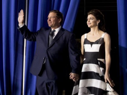Florida Gov. Ron DeSantis and his wife Casey DeSantis arrive before President Donald Trump speaks to a Venezuelan American community at Florida Ocean Bank Convocation Center at Florida International University in Miami, Fla., Monday, Feb. 18, 2019, to speak out against President Nicolas Maduro's government and its socialist policies. (AP …