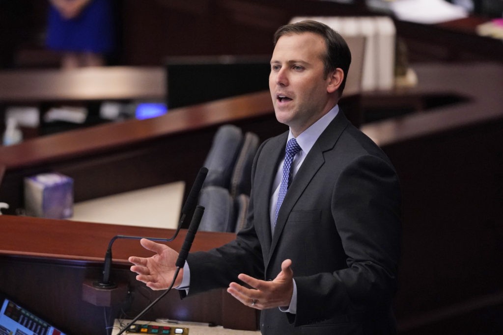 House Speaker Chris Sprowls acknowledges retiring Director of Florida's Division of Emergency Management, Jared Moskowitz, during a legislative session, Tuesday, April 27, 2021, at the Capitol in Tallahassee, Fla. (AP Photo/Wilfredo Lee)