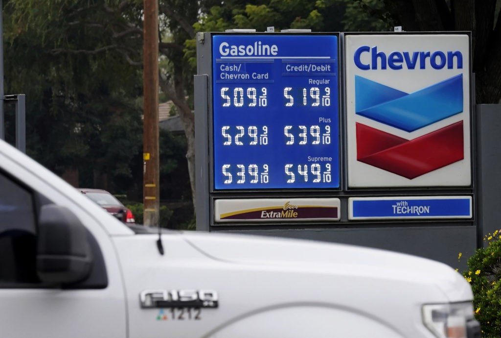 CORRECTS DATE- Chevron Gas prices over the $5 mark are displayed in Visalia, Calif., Tuesday, Nov. 16, 2021. (AP Photo/Rich Pedroncelli)