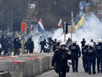 Police confront protestors during a demonstration against COVID-19 measures in Brussels, S