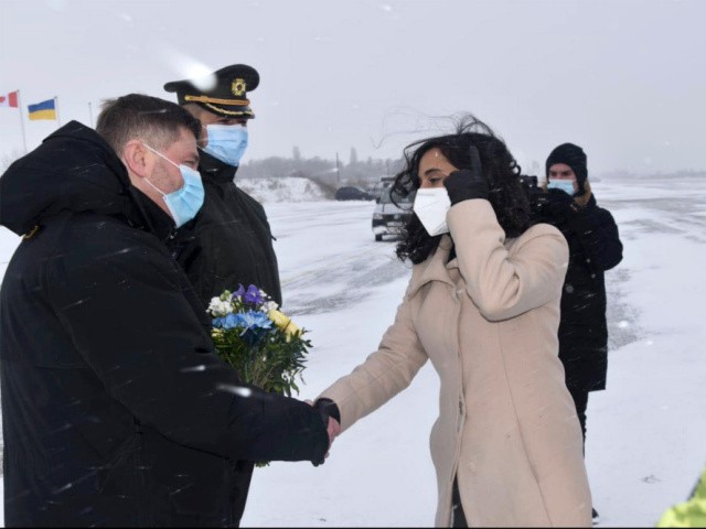 In this photo provided by the Ukrainian Defense Press Service, Ukrainian Deputy Minister of Defense Oleksandr Polishchuk, left, greets Canadian Defense Minister Anita Anand in Kyiv, Ukraine, Sunday, Jan. 30, 2022. Russia's foreign minister claims that NATO wants to pull Ukraine into the alliance, amid escalating tensions over NATO expansion and fears that Russia is preparing to invade Ukraine. In comments on state television Sunday, Foreign Minister Sergey Lavrov also challenged NATO's claim to be a purely defensive structure. (Ukrainian Defense Ministry Press Service via AP)