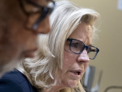 Vice Chair Liz Cheney, R-Wyo., of the House panel investigating the Jan. 6 U.S. Capitol insurrection, joined at left by Chairman Bennie Thompson, D-Miss., testifies before the House Rules Committee seeking contempt of Congress charges against former President Donald Trump's White House chief of staff Mark Meadows for not complying …