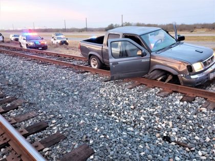 Human Smugglers crash a Nissan truck on a railroad track while fleeing from law enforcement. (U.S. Border Patrol/Laredo Sector)