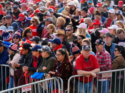 Thousands attend a Save America Rally prior to former President Donald Trump speaking to crowd Saturday, Jan. 15, 2022, in Florence, Ariz. (AP Photo/Ross D. Franklin)