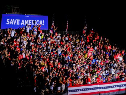 SARASOTA, FL - JULY 03: People listen to former U.S. President Donald Trump during a rally