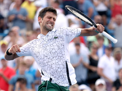 MASON, OH - AUGUST 19: Novak Djokovic of Serbis celebrates his win over Roger Federer of S