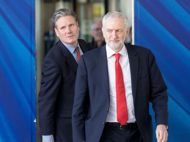 BRUSSELS, BELGIUM - MARCH 21, 2019 : Shadow Secretary of State for Exiting the European Union Sir Keir Starmer KCB QC (L) and the British Labour leader and Leader of the Opposition, Jeremy Corbyn (R) talk to the media at the Berlaymont, the EU Commission headquarters on March 21, 2019 …