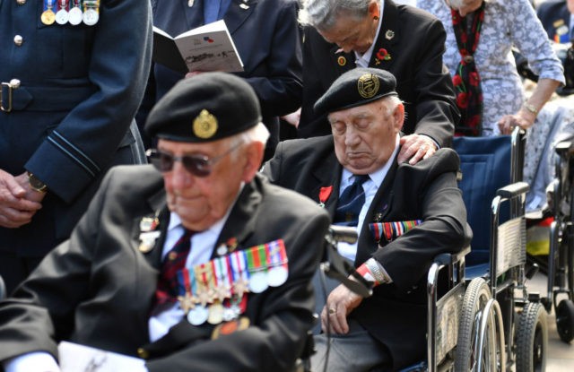 TOPSHOT - Veterans attend a service at the National Memorial Arboretum in Alrewas, Staffordshire on June 6, 2019, during an event to commemorate the 75th anniversary of the D-Day landings. (Photo by Anthony Devlin / POOL / AFP) (Photo credit should read ANTHONY DEVLIN/AFP via Getty Images)