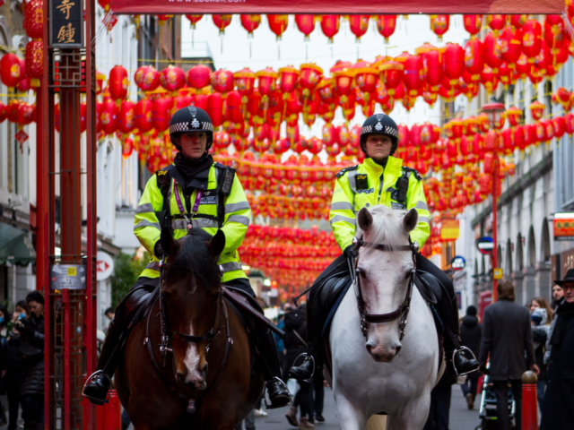 LONDON, ENGLAND - JANUARY 24: Police Officers on horseback patrol Chinatown on January 24, 2020 in London, England. The neighborhood will be the main hub of Chinese New Year celebrations in London as we enter the Year of the Rat tomorrow. (Photo by Lauren Hurley/Getty Images)