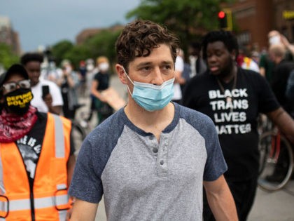 MINNEAPOLIS, MN - JUNE 6: Minneapolis Mayor Jacob Frey looks over a demonstration calling for the Minneapolis Police Department to be defunded on June 6, 2020 in Minneapolis, Minnesota. Mayor Frey spoke at the head of the march but was asked to leave by the organizers after declining to commit …