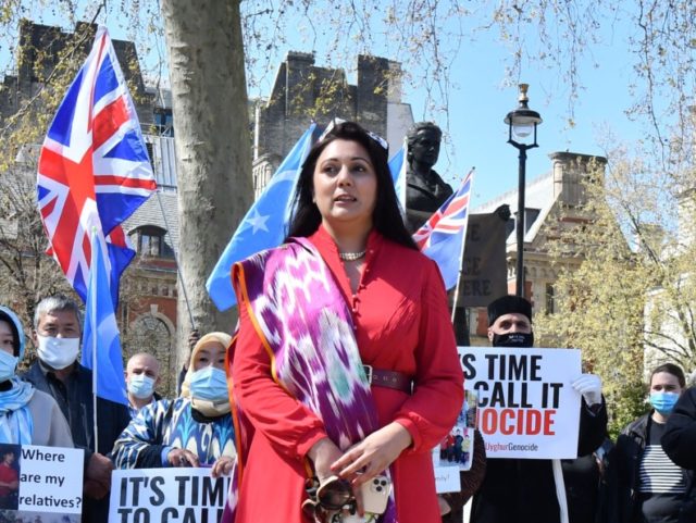 British Conservative Party MPs Nusrat Ghani (C) and Iain Duncan Smith (R) join members of the Uyghur community as they demonstrate to call on the British parliament to vote to recognise alleged persecution of China's Muslim minority Uyghur people as genocide and crimes against humanity in London on April 22, …