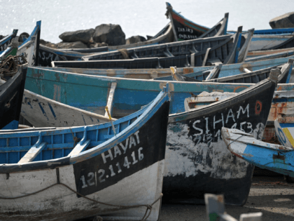 Vessels accumulate at a 'boat cemetery' in Arinaga on the Spanish Canary island of Gran Canaria on November 18, 2021. - For worried relatives, trying to find information about people without papers on a boat with no passenger list that got lost on the notoriously dangerous route to Spain's Atlantic …