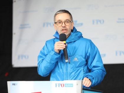 Herbert Kickl, leader of Austria's Freedom Party (FPOe), speaks to protesters during