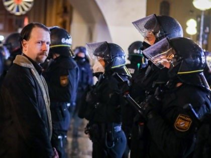 MUNICH, GERMANY - DECEMBER 29: Police officers attend as people protest against vaccinatio