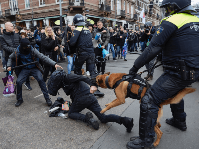 AMSTERDAM, NETHERLANDS - JANUARY 02: Clashes erupt between police anti-riot officers and a