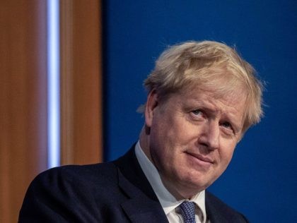 Britain's Prime Minister Boris Johnson speaks during a virtual press conference to up