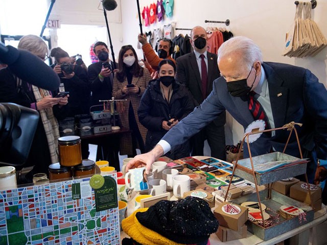 US President Joe Biden shops for gifts during a visit to Honey Made, a small business in Washington, DC, on January 25, 2022. (Photo by SAUL LOEB / AFP) (Photo by SAUL LOEB/AFP via Getty Images)