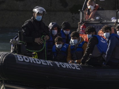 DOVER, ENGLAND - SEPTEMBER 09: Migrants are brought into Dover docks by Border Force staff on September 9, 2021 in Dover, England. Facing a continued rise in migrant arrivals across the English Channel, the British government has authorised its Border Force to turn back boats while at sea, in some …