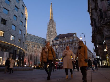 VIENNA, AUSTRIA - NOVEMBER 24: People cross Stephansplatz on the third day of a nationwide, temporary lockdown during the fourth wave of the novel coronavirus pandemic on November 24, 2021 in Vienna, Austria. The measure, in which people are only allowed to leave home for essentials and to go to …