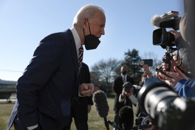 WASHINGTON, DC - JANUARY 11: U.S. President Joe Biden speaks to reporters before boarding Marine One on the South Lawn of the White House on January 11, 2022 in Washington, DC. President Biden is visiting Atlanta, Georgia, along with U.S. Vice President Kamala Harris and several lawmakers to deliver remarks …