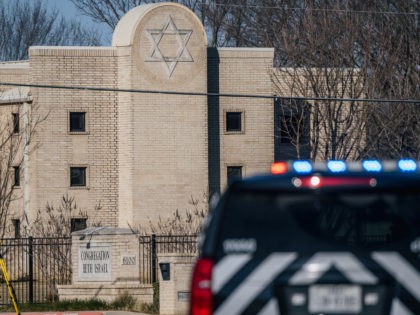 COLLEYVILLE, TEXAS - JANUARY 16: A law enforcement vehicle sits in front of the Congregation Beth Israel synagogue on January 16, 2022 in Colleyville, Texas. All four people who were held hostage at the Congregation Beth Israel synagogue have been safely released after more than 10 hours of being held …