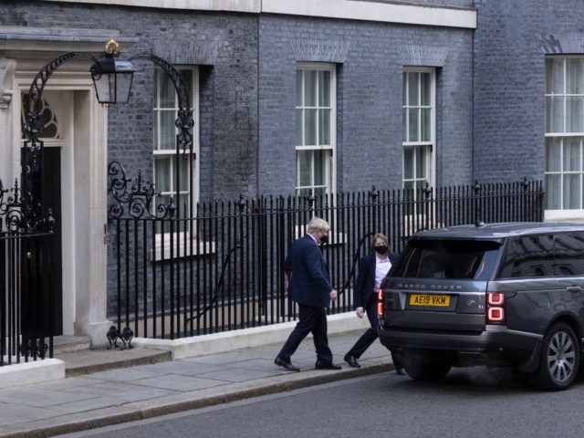 LONDON, ENGLAND - JANUARY 19: Prime Minister Boris Johnson leaves 10 Downing Street on January 19, 2022 in London, England. The Prime Minister faces MPs in the House Of Commons as speculation over a vote of no confidence in his leadership mounts. (Photo by Dan Kitwood/Getty Images)