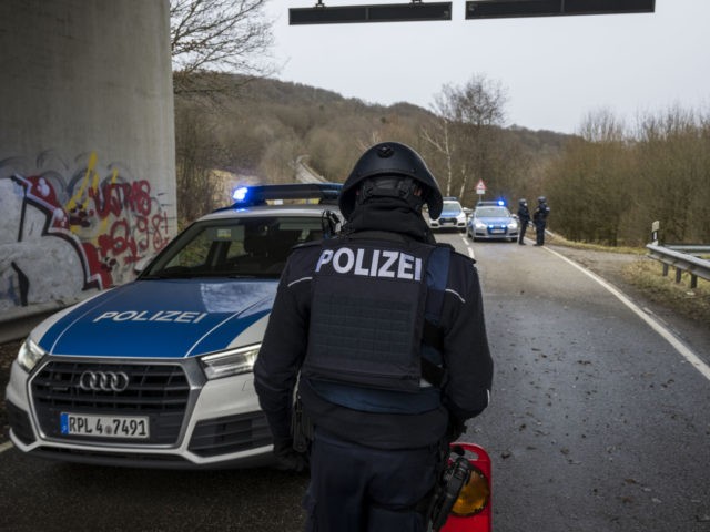 KUSEL, GERMANY - JANUARY 31: Police officers block a road leading to the scene of a shooti