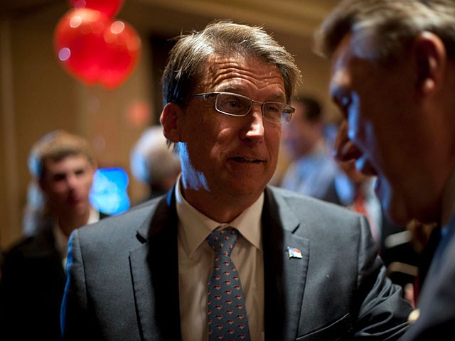 CHARLOTTE, NC - NOVEMBER 4: North Carolina Gov. Pat McCrory (C) speaks with guests at U.S. Rep. Thom Tillis's watch party at The Omni Hotel Ballroom on November 4, 2014, in Charlotte, North Carolina. U.S. Rep. Thom Tillis (R-NC) is running in a tight race for the North Carolina Senate seat against opponent U.S. Sen. Kay Hagan (D-NC). (Photo by Davis Turner/Getty Images)