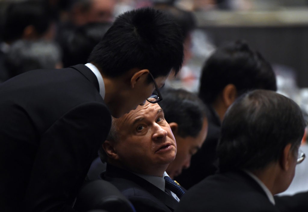 BEIJING, CHINA - NOVEMBER 07: Russian Ambassador to China Andrey Denisov (C) attends the Asia-Pacific Economic Cooperation (APEC) Summit at the China National Convention Centre (CNCC) on November 7, 2014 in Beijing, China. From 7-11 November leaders & senior administration from 21 countries will convene in Beijing, with the President of the United States Barack Obama and Russian President Vladimir Putin expected to attend. (Photo by Greg Baker - Pool/Getty Images)