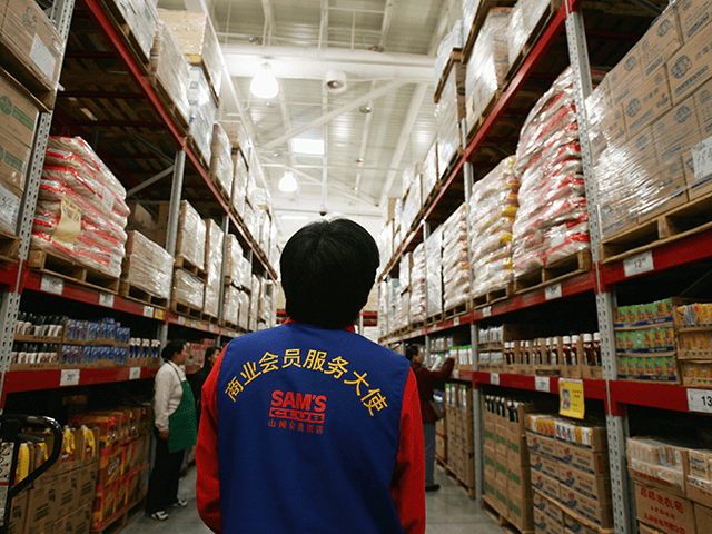 People work at Sam's club, the first branch of a Wal-Mart owned store in the capital on De