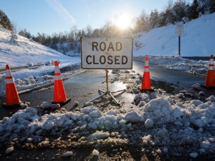 STAFFORD COUNTY, VIRGINIA - JANUARY 04: The entrance ramp to I-95 is closed after a winter storm dumped a foot of snow on the area overnight on January 04, 2022 near Fredericksburg in Stafford County, Virginia. A winter storm with record snowfall slammed into the Mid-Atlantic states, stranding thousands of …