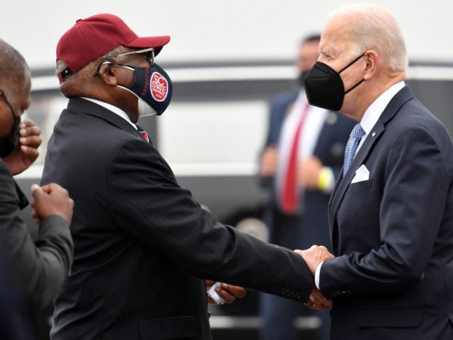 US President Joe Biden is welcomed by US Representative Jim Clyburn on arrival at Columbia Metropolitan Airport in West Columbia, South Carolina, on December 17, 2021. - President Biden will deliver a commencement address to graduates of of South Carolina State University. (Photo by MANDEL NGAN / AFP) (Photo by …