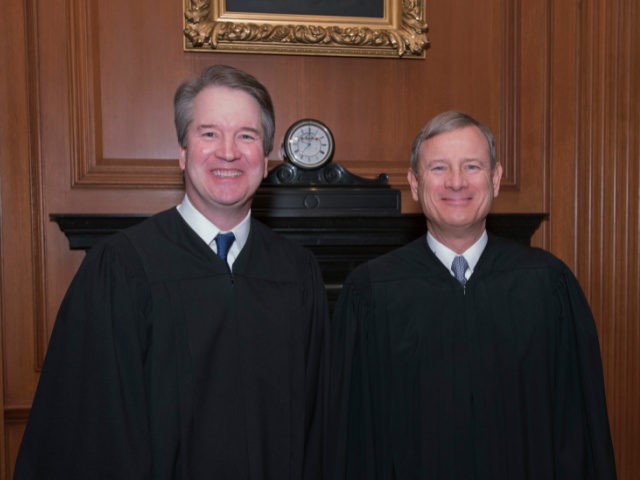 This image provided by the U.S. Supreme Court show Associate Justice Brett M. Kavanaugh, left and Chief Justice John G. Roberts, Jr. in the Justices' Conference Room before a investiture ceremony Thursday, Nov. 8, 2018, at the Supreme Court in Washington. (Fred Schilling/Collection of the Supreme Court of the United …