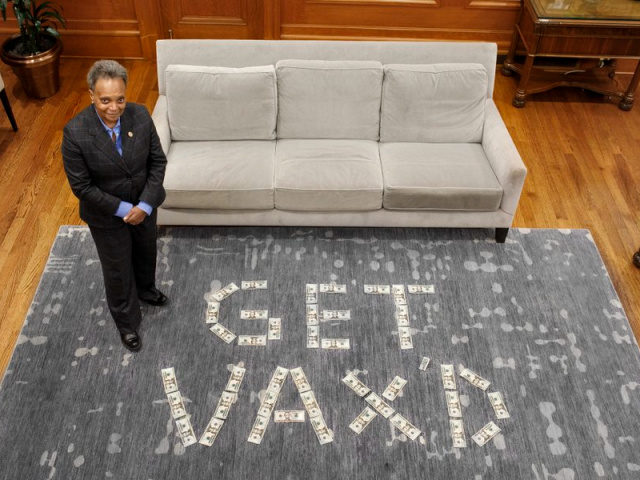 Chicago Mayor Lori Lightfoot’s (D) latest pitch to get Chicagoans vaccinated became the subject of mockery this week after she posted a photo to social media next to a stack of cash spelling out the phrase “Get vax’d.”