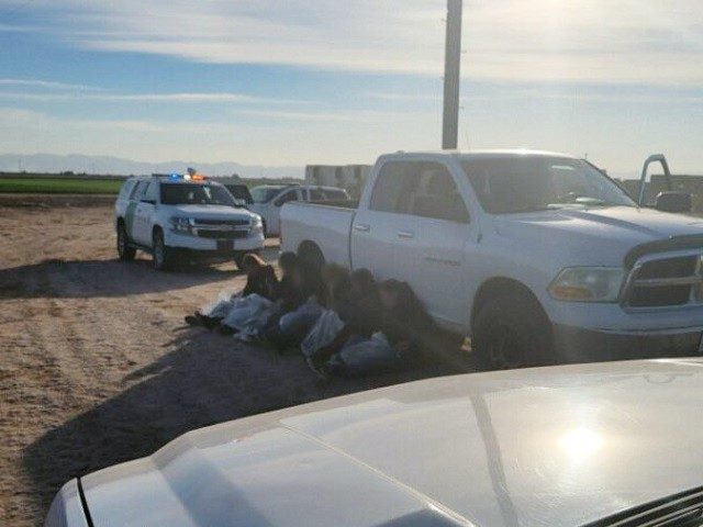 Calexico Station Border Patrol agents apprehend a group of migrants and a human smuggler with two arrest warrants. (U.S. Border Patrol/El Centro Sector)