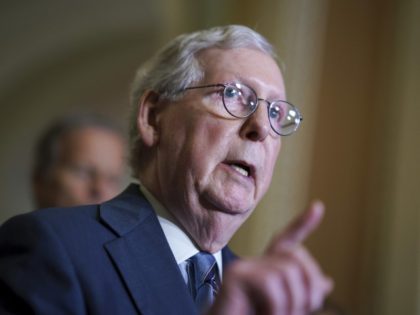 Senate Minority Leader Mitch McConnell, R-Ky., speaks to reporters after a Republican poli