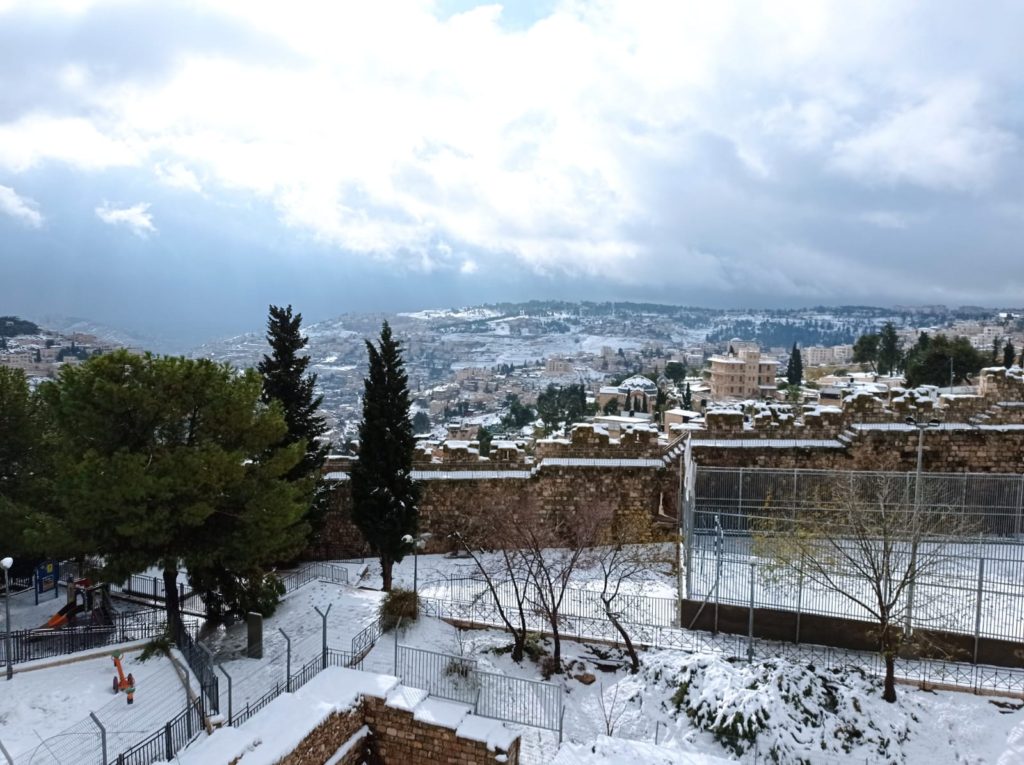 A Jerusalem city landscape transformed by winter snow (Deborah Brand/Breitbart News)
