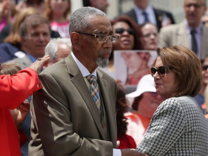 WASHINGTON, DC - JUNE 22: U.S. Rep. Bobby Rush (D-IL) (C), whose son was a gun violence victim, is comforted by House Minority Leader Rep. Nancy Pelosi (D-CA) (R) and Rep. Brenda Lawrence (D-MI) (L) after he spoke during a news conference on gun control June 22, 2016 on Capitol …