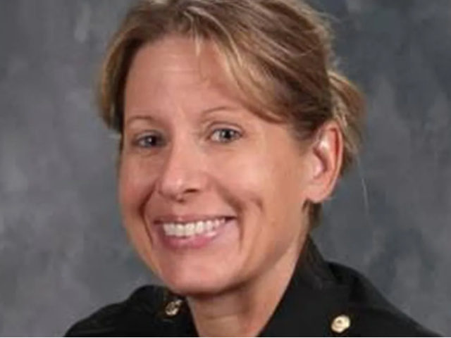 Authorities arrested two individuals Friday who are suspected of killing an Illinois police sergeant, Sgt. Marlene Rittmanic, and wounding her partner in a hotel shooting.