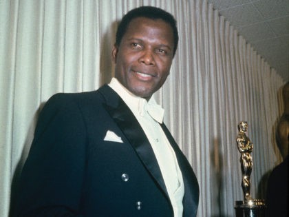 Bahamian American actor Sidney Poitier holding his Academy Award for Best Actor in a Leading Role for 'Lilies Of The Field', directed by Ralph Nelson, at the 36th Academy Awards ceremony, 13th April 1964. The ceremony was held at the Santa Monica Civic Auditorium, Santa Monica, California. (Photo by Archive …
