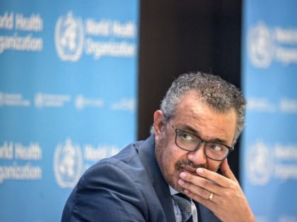 World Health Organization (WHO) Director-General Tedros Adhanom Ghebreyesus attends a press conference on December 20, 2021 at the WHO headquarters in Geneva. - The World Health Organization chief called for the world to pull together and make the difficult decisions needed to end the Covid-19 pandemic within the next year. …