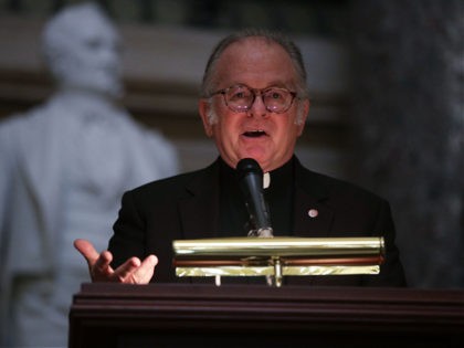 WASHINGTON, DC - SEPTEMBER 27: The US House Chaplain, Father Pat Conroy, speaks during a memorial service at the National Statuary Hall of the Capitol September 27, 2017 in Washington, DC. The Association of Former Members of Congress held a memorial service honoring those members who have passed away in …