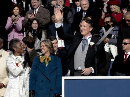 RICHMOND, VIRGINIA - JANUARY 15: Virginia Governor Glenn Youngkin waves to the crowd after being sworn in as the 74th Governor of Virginia on the steps of the State Capitol on January 15, 2022 in Richmond, Virginia. Youngkin, who once served as co-CEO of the private equity firm The Carlyle …