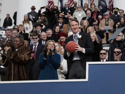 RICHMOND, VIRGINIA - JANUARY 15: Virginia Governor Glenn Youngkin holds a basketball thrown to him by the Norfolk Academy Basketball Team during the 74th Virginia inaugural ceremonies on the steps of the State Capitol on January 15, 2022, in Richmond, Virginia. Youngkin, who once served as co-CEO of the private …