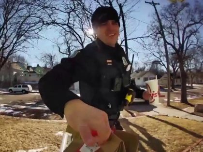 A Sioux Falls, South Dakota, resident named Anastasia Elsinger was greeted by someone unexpected at her door on Tuesday when a policeman handed over her Arby's DoorDash order.