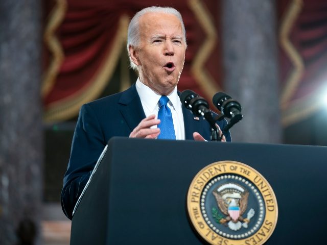 WASHINGTON, DC - JANUARY 06: US President Joe Biden gives remarks in Statuary Hall of the U.S Capitol on January 6, 2022 in Washington, DC. One year ago, supporters of President Donald Trump attacked the U.S. Capitol Building in an attempt to disrupt a congressional vote to confirm the electoral …