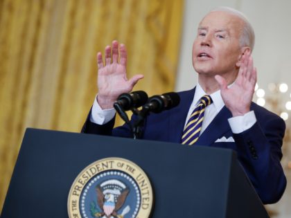 WASHINGTON, DC - JANUARY 19: U.S. President Joe Biden answers questions during a news conference in the East Room of the White House on January 19, 2022 in Washington, DC. With his approval rating hovering around 42-percent, Biden is approaching the end of his first year in the Oval Office …