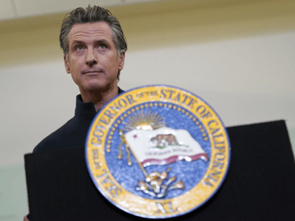 Gov. Gavin Newsom speaks at Asian Health Services in Oakland, Calif., Wednesday, Oct. 27, 2021. Newsom, who has been absent from public life in nearly two weeks after canceling his planned trip to Scotland for the United Nation's climate conference, is expected to appear at the the 2021 California Economic …